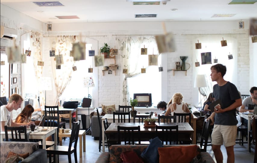 Interior of a modern Moscow café with warm lighting